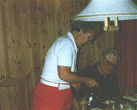 Eva serving breakfast at their mountain house